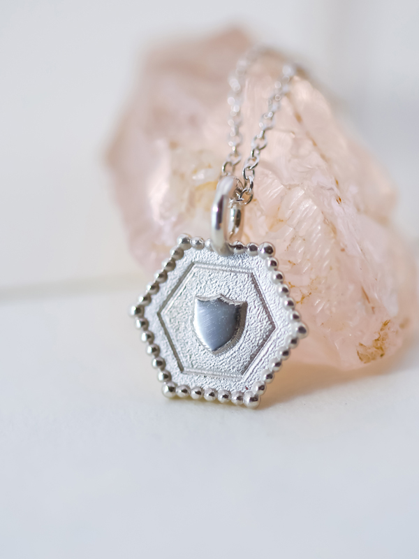 silver shield charm necklace